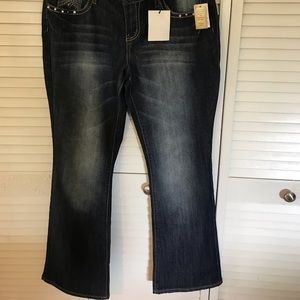 Women’s distressed blue jeans